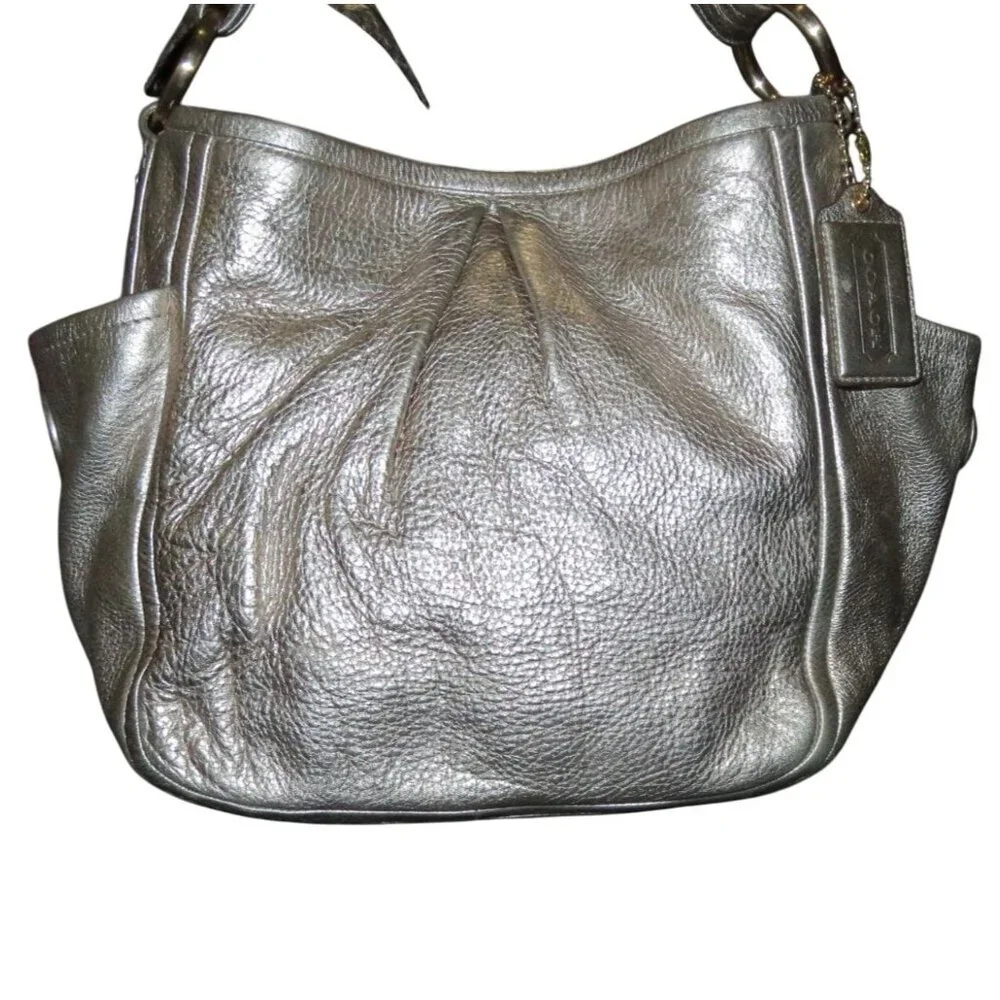 Coach spacious gold description